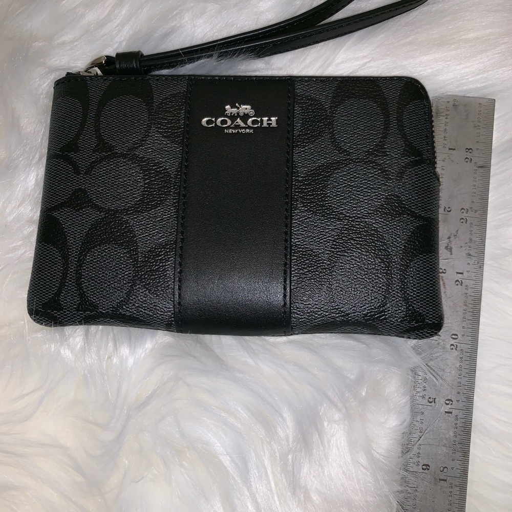 Authentic Coach wristlet. Black signature. NWT